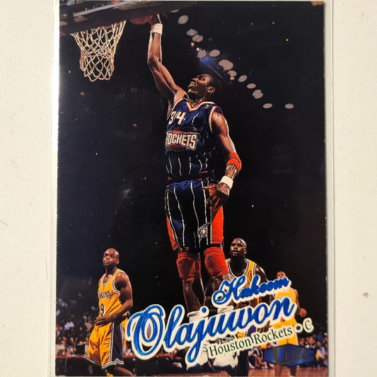 Hakeem Olajuwon 1997 Fleer 97-98 #82 NBA Basketball Houston Rockets Excellent Sleeved