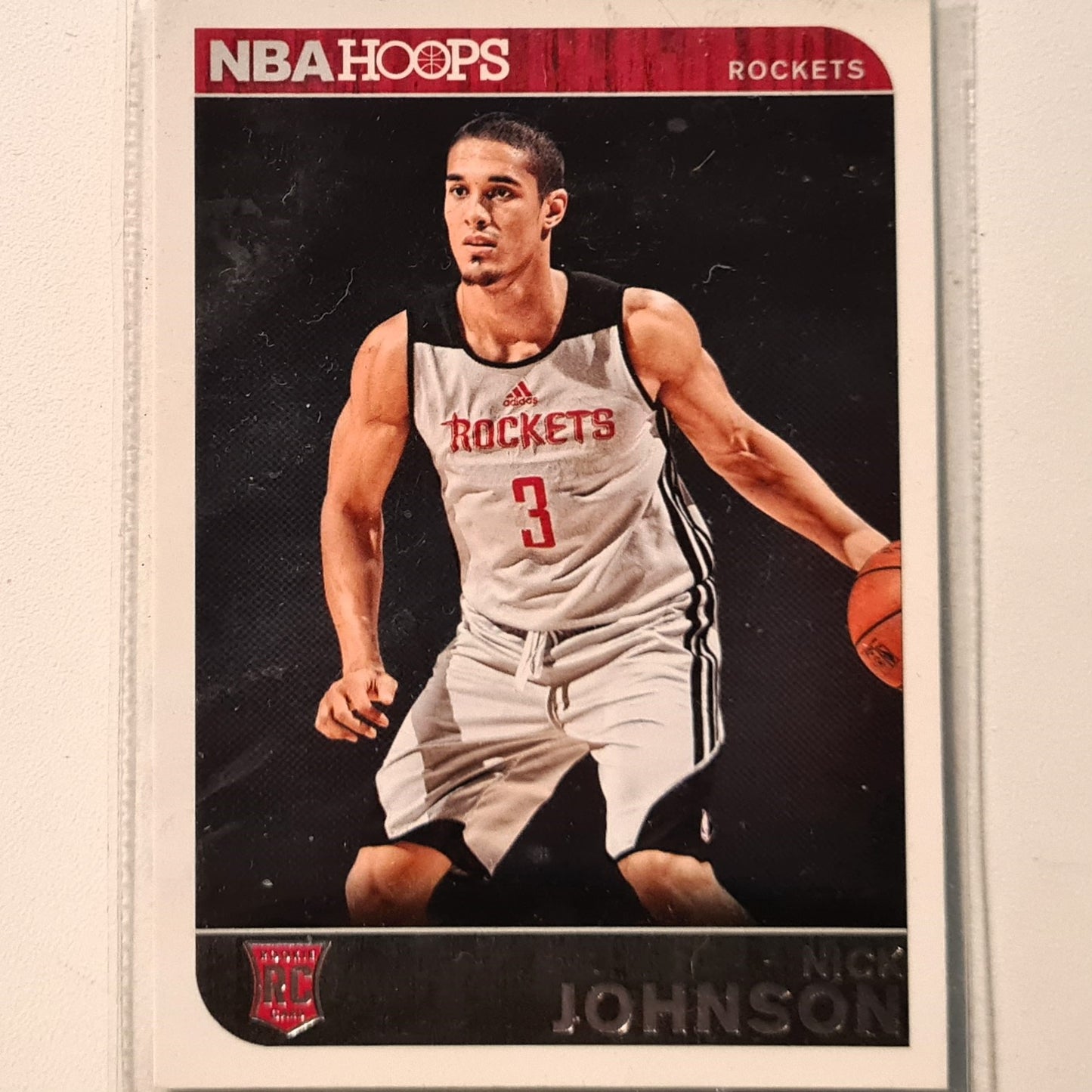 Nick Johnson 2014-15 Panini NBA Hoops Rookie RC #295 NBA Basketball Houston Rockets Excellent sleeved