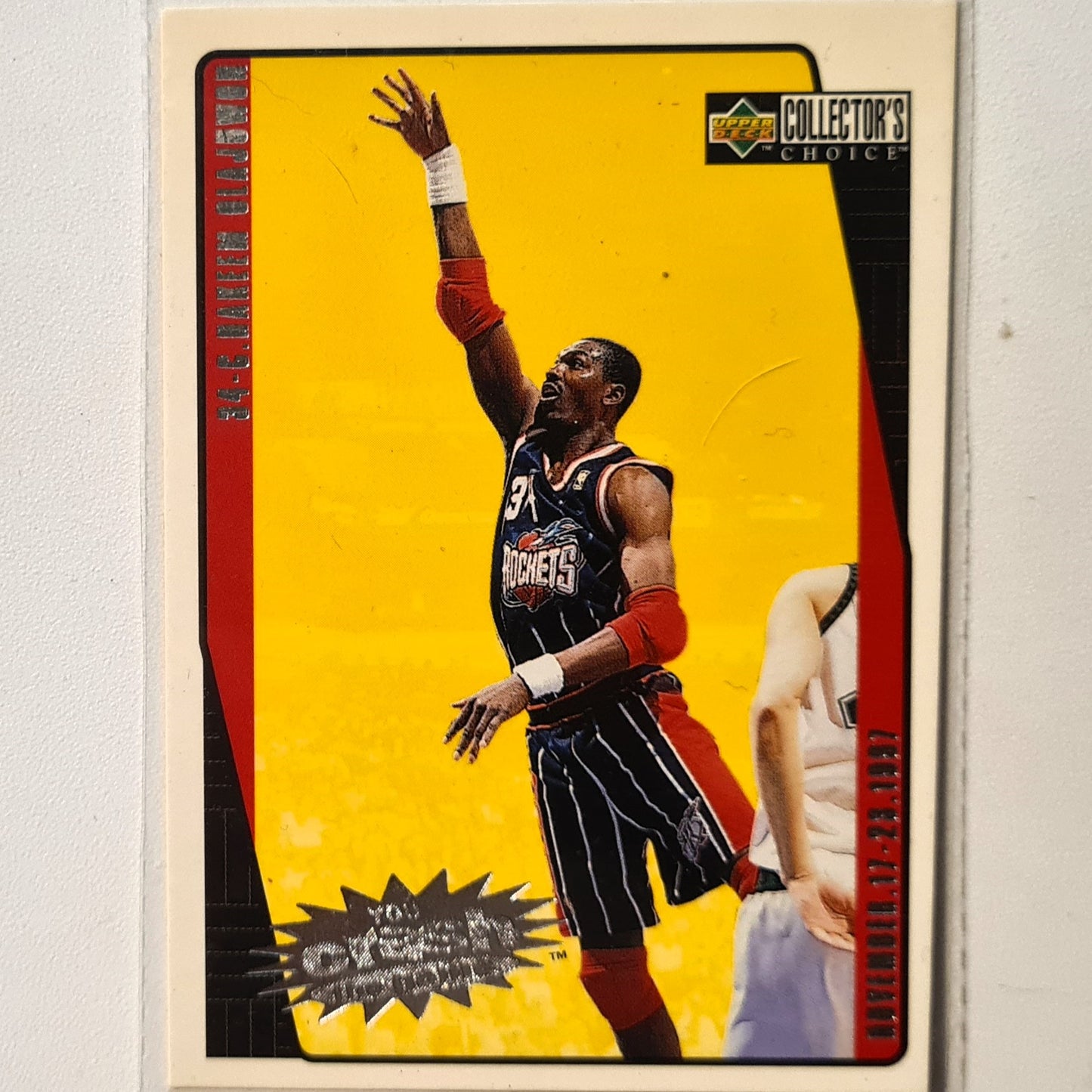 Hakeem Olajuwon 1997 Upper Deck you crash the game C10 NBA Basketball Houston Rockets very good sleeved