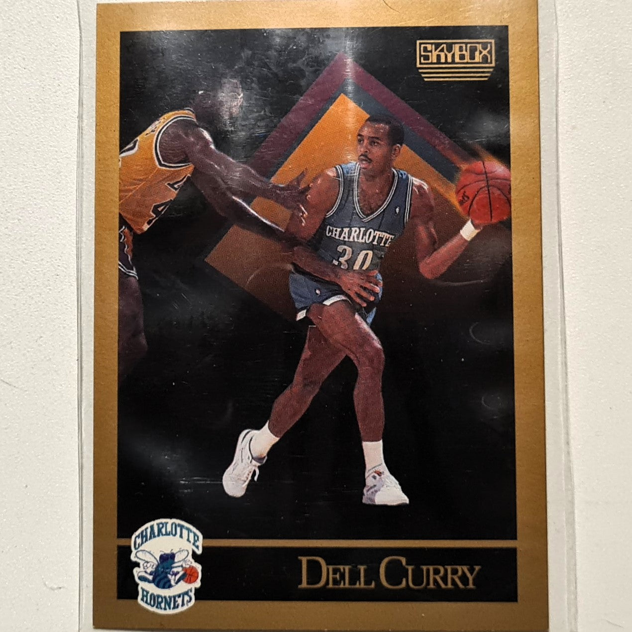 Dell Curry 1990 Skybox #28 NBA Basketball Charlotte Hornets very good Sleeved