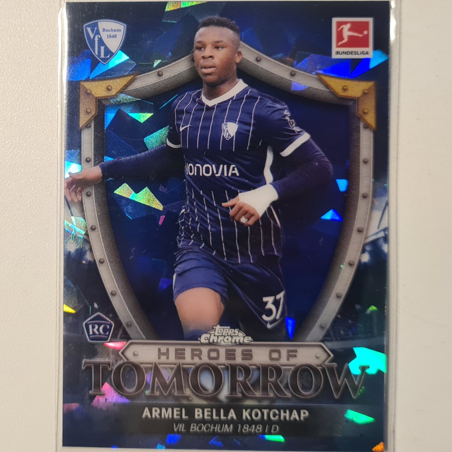 Armel Bella Kotchap 2022 Topps Chrome Bundesliga Heroes of tomorrow rookie  BLUE CRACKED ICE HT-AB football Bochum mint sleeved