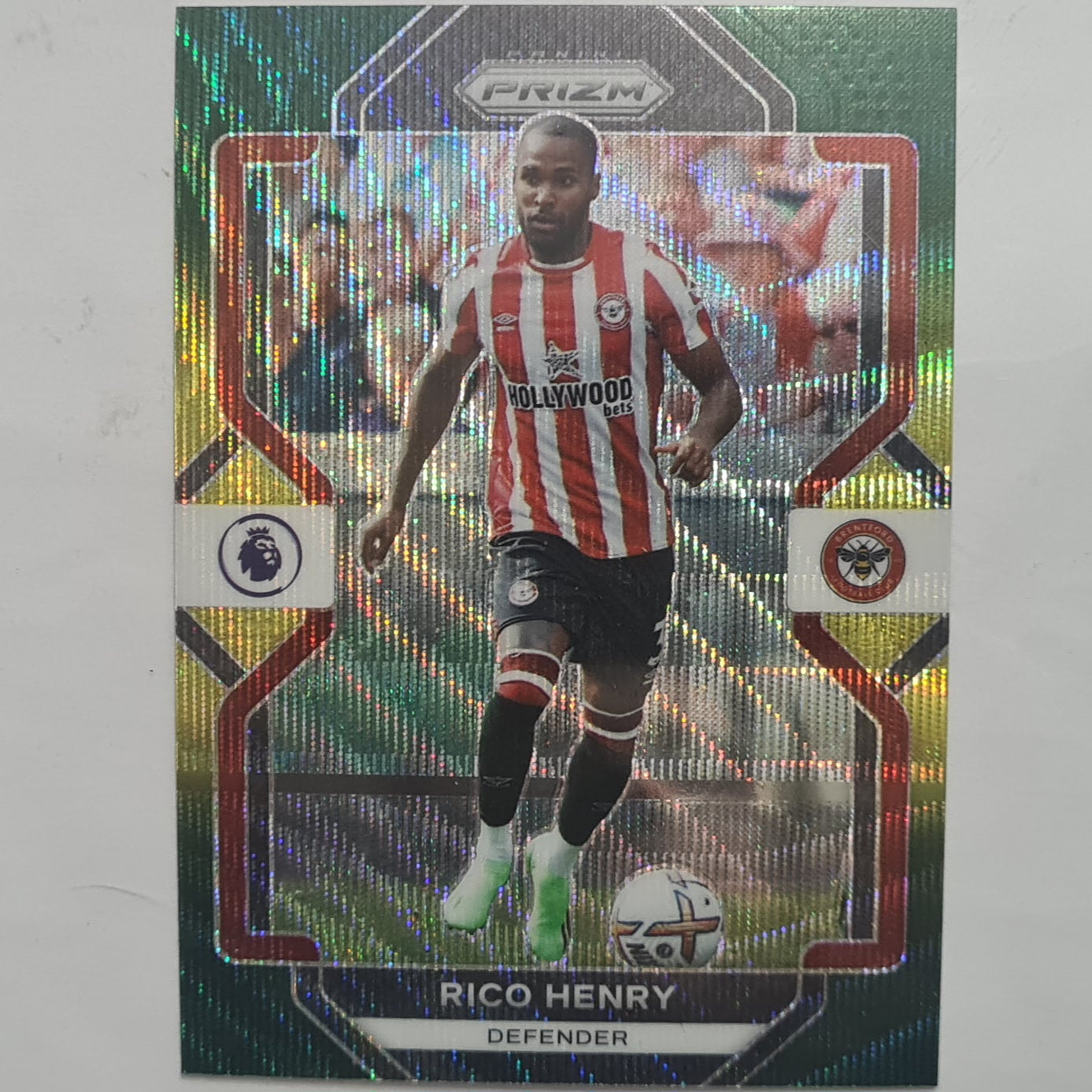 Rico Henry 2022-23 Panini Prizm premier league green yellow wave #33 Football Brentford ex-mint sleeved