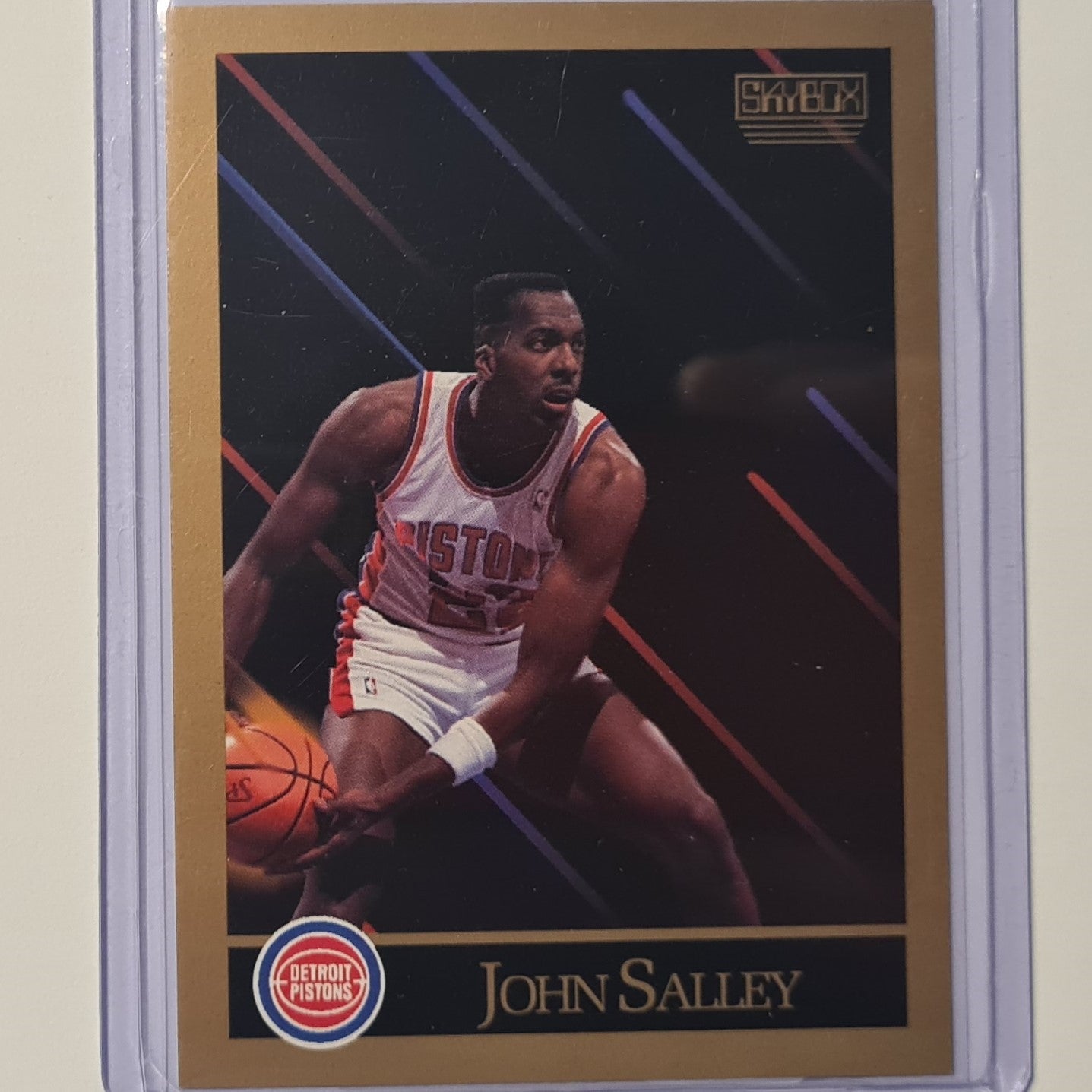 John Salley 1990 Skybox inaugural #92 NBA Basketball Detroit Pistons ex-mint sleeved