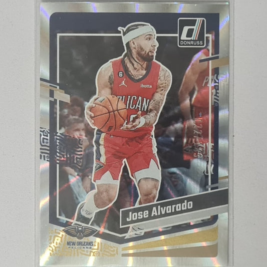 Jose Alvarado 2023-24 Panini Donruss silver laser 022/149 #77 NBA Basketball New Orleans Pelicans ex-mint sleeved