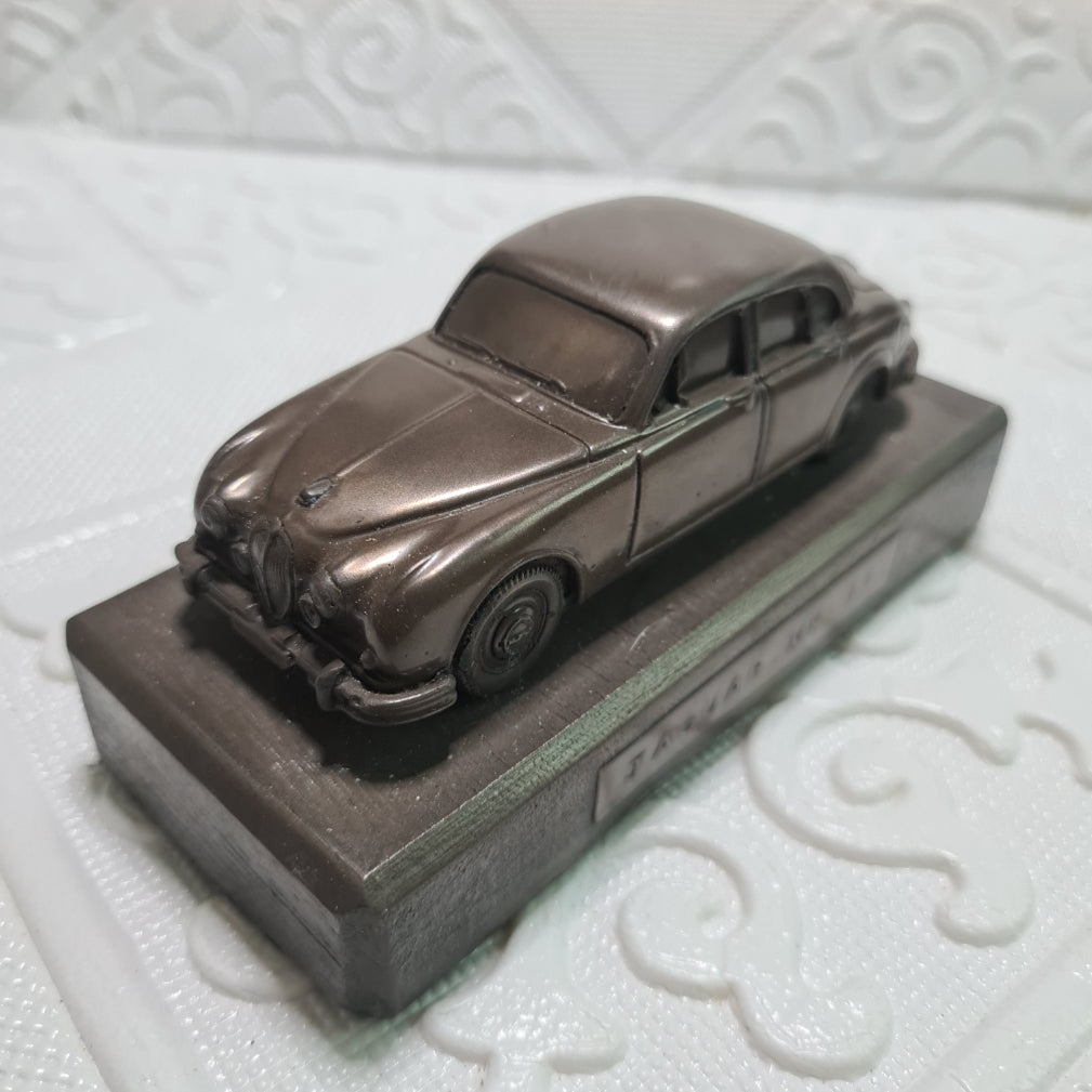 Jaguar MK II Bronze ? metal cast car on plinth heavy thing maker unknown 1:43 approx