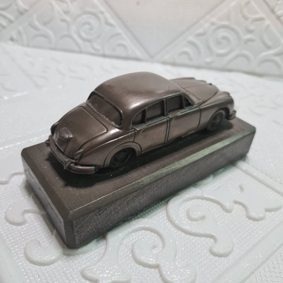 Jaguar MK II Bronze ? metal cast car on plinth heavy thing maker unknown 1:43 approx