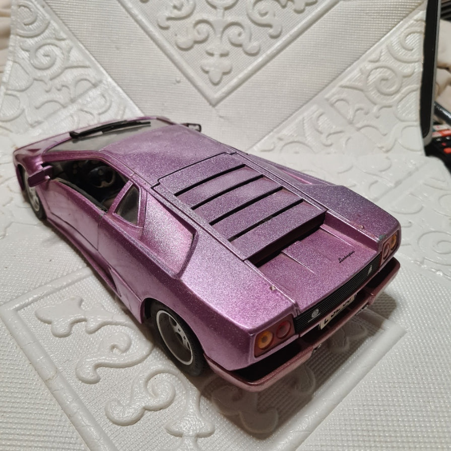 Maisto 1:18 Lamborghini Diablo dark metallic pink diecast model used will show some wear