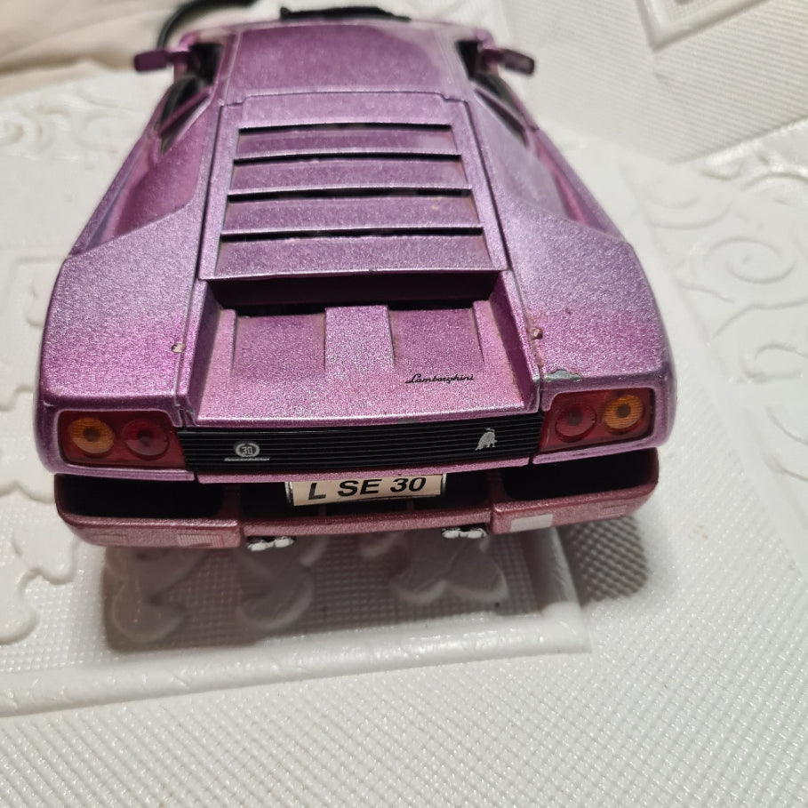 Maisto 1:18 Lamborghini Diablo dark metallic pink diecast model used will show some wear