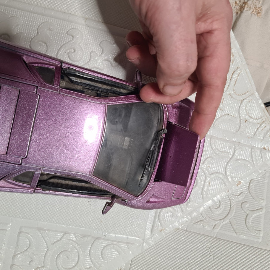 Maisto 1:18 Lamborghini Diablo dark metallic pink diecast model used will show some wear