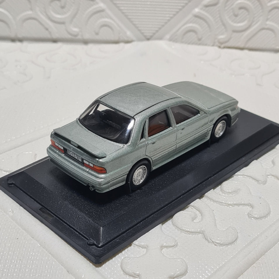 033 1:43 Trofeu Mitsubishi Galant GTI 16V road car metallic sand boxed diecast