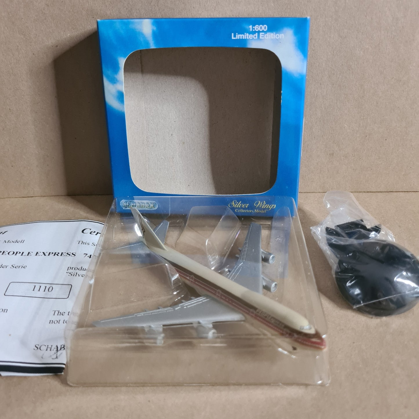 Schabak 1:600 Boeing 747-200 people express silver wings diecast plane 2901/204 VGC  boxed