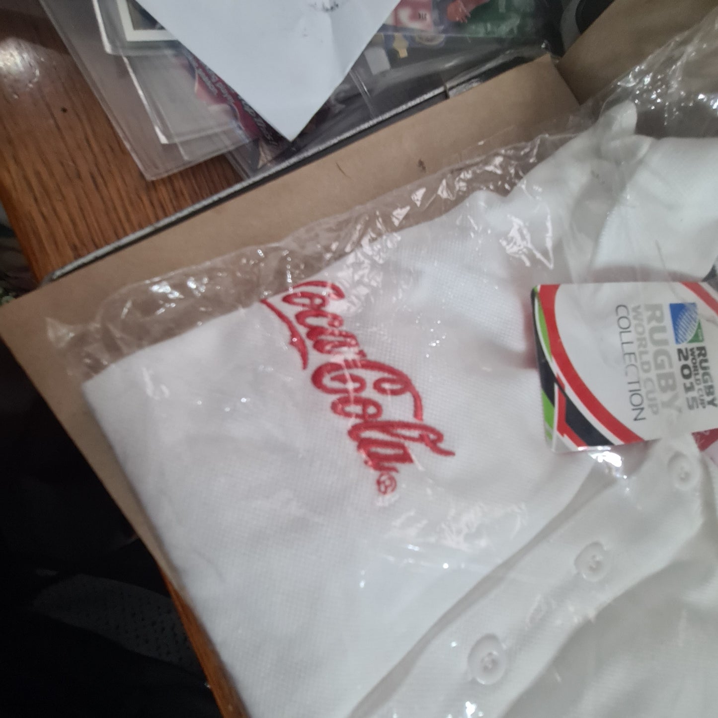 2015 Rugby World cup unused in packet size Small Coca-Cola sponsored polo shirt white