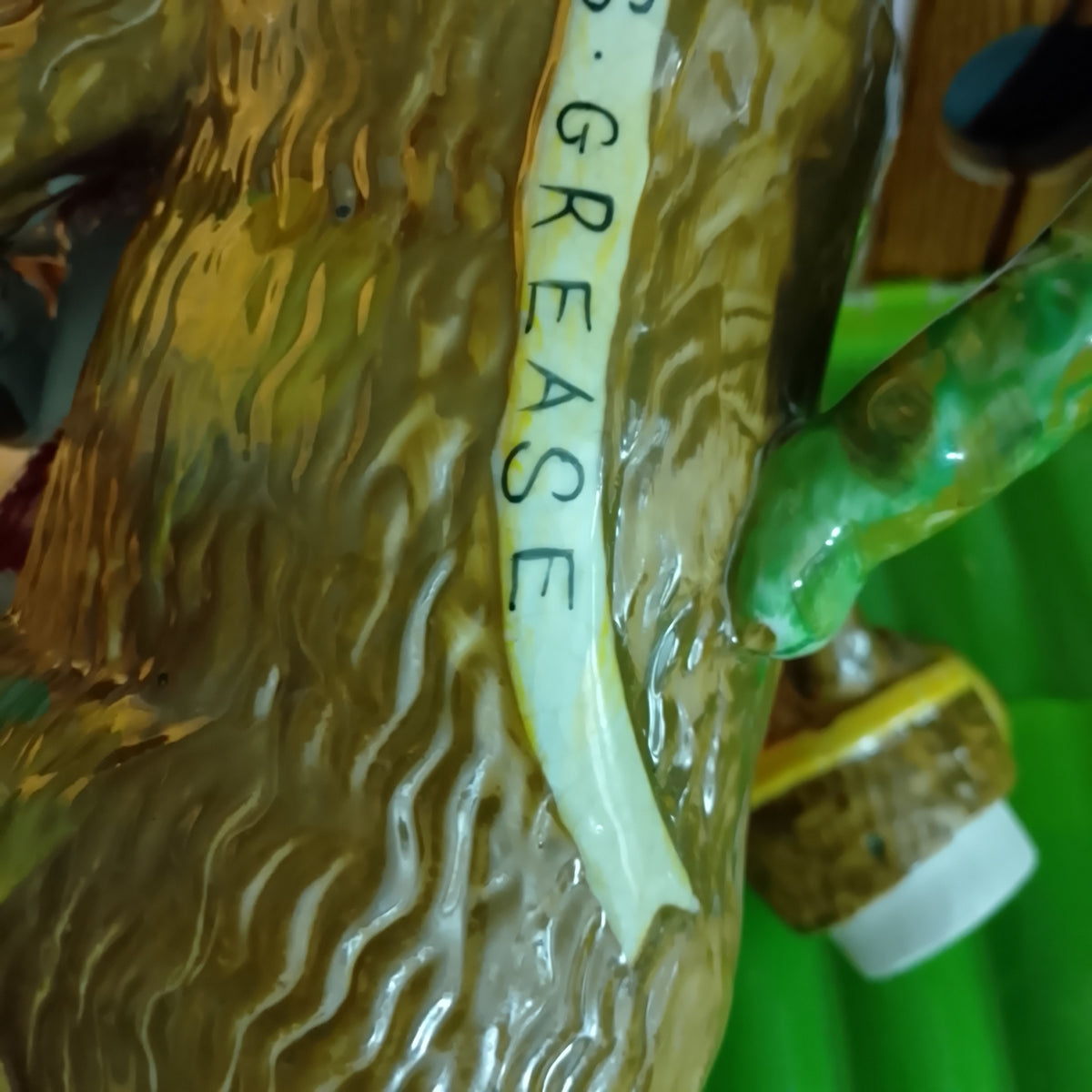 Staffordshire pottery Greased bear jug , Bear holding a dog , advertising pottery so nice !!