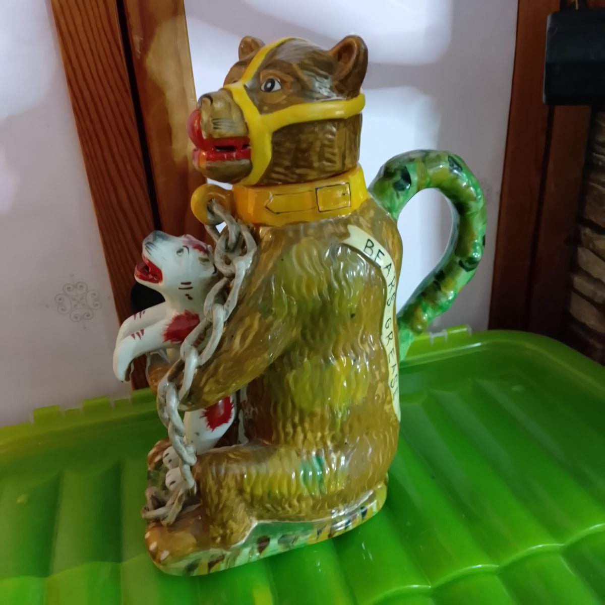 Staffordshire pottery Greased bear jug , Bear holding a dog , advertising pottery so nice !!