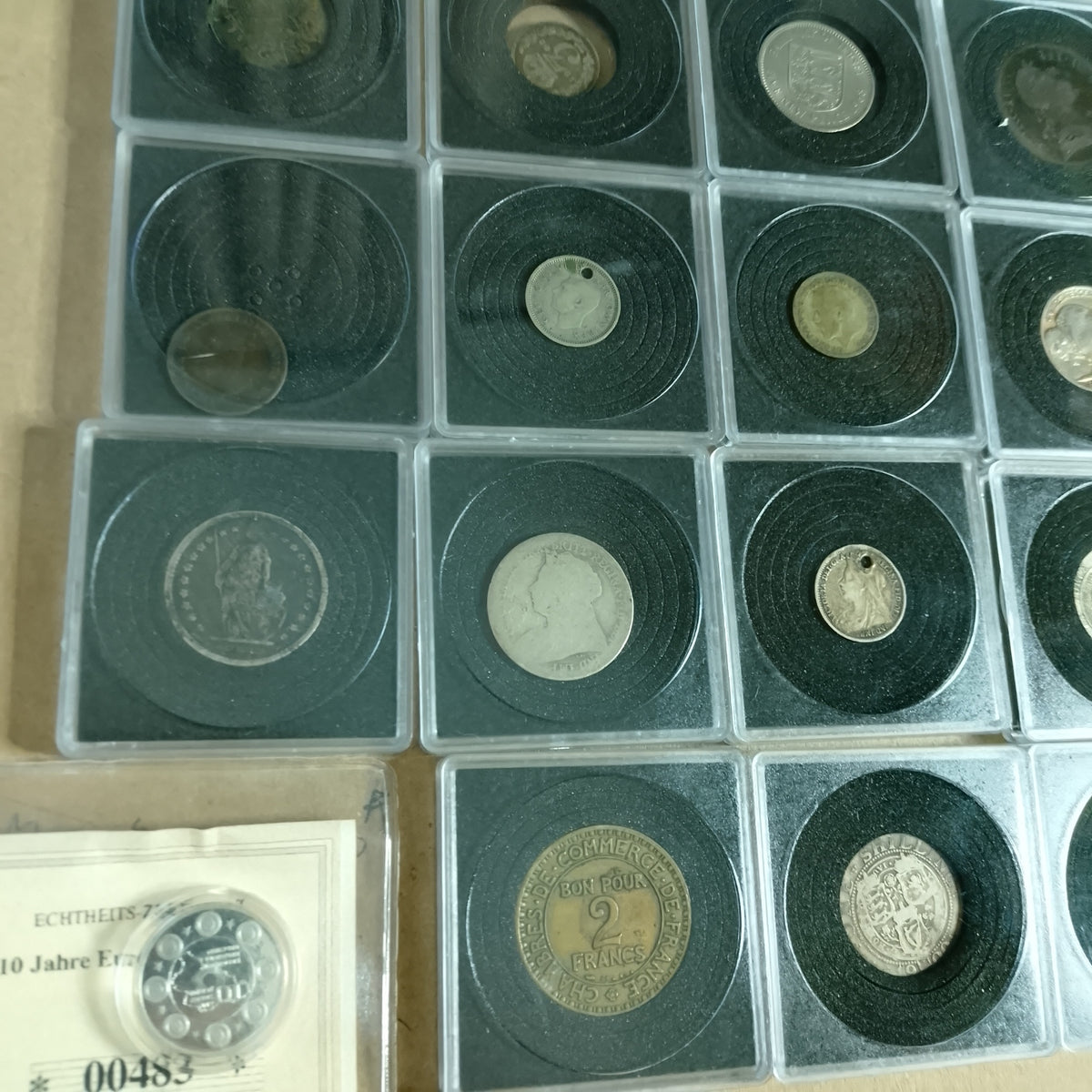 collection of mixed coins in capsules silver roman old etc worth sorting great value